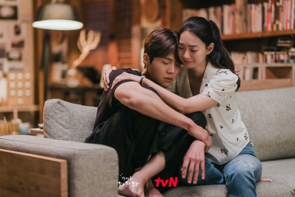 Shin Min-a and Kim Seon-ho smiling together in seaside village drama Hometown Cha-Cha-Cha.